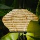 an-intricate-lamp-that-is-made-out-of-banana-paper